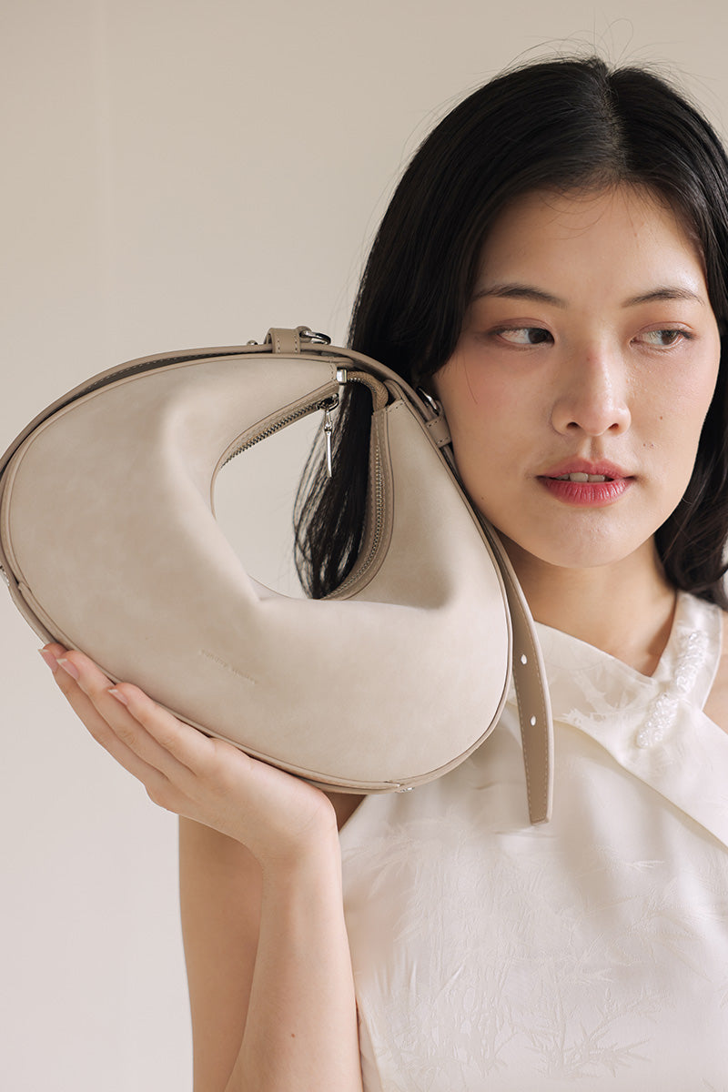 [PRE-ORDER] Reunion Tuan Crescent Bag in Stone Suede