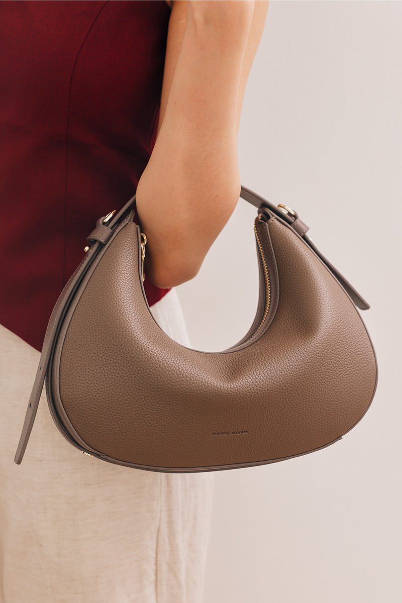 Reunion Tuan Crescent Bag in Taupe Pebble