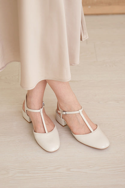 Malorie Tbar Heels in Cream Patent