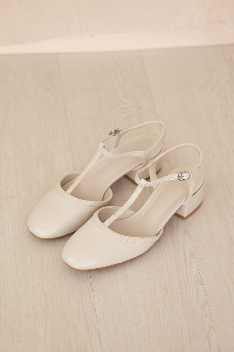 Malorie Tbar Heels in Cream Patent