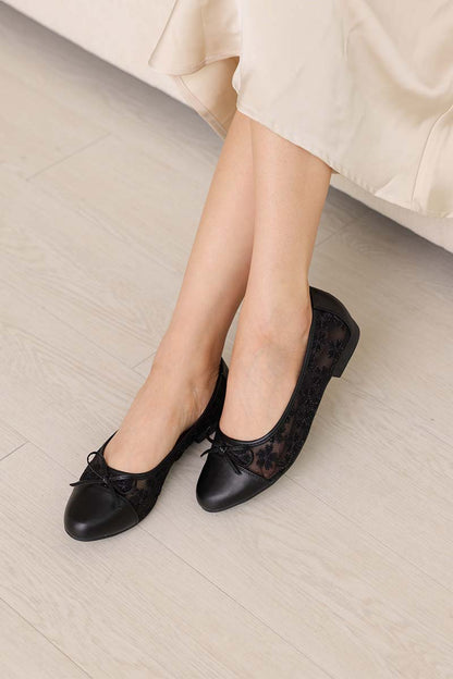Roux Embroidered Flats in Black